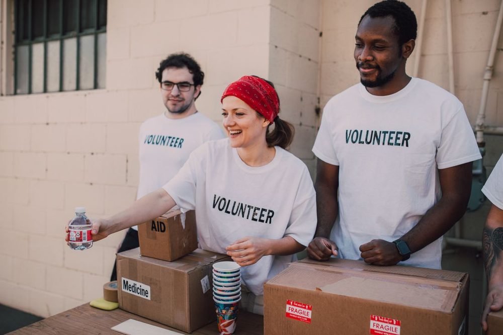 Volunteers handing out supplies together